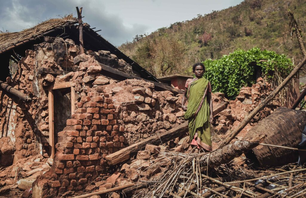 Before and after image of a disaster-affected area showing recovery progress